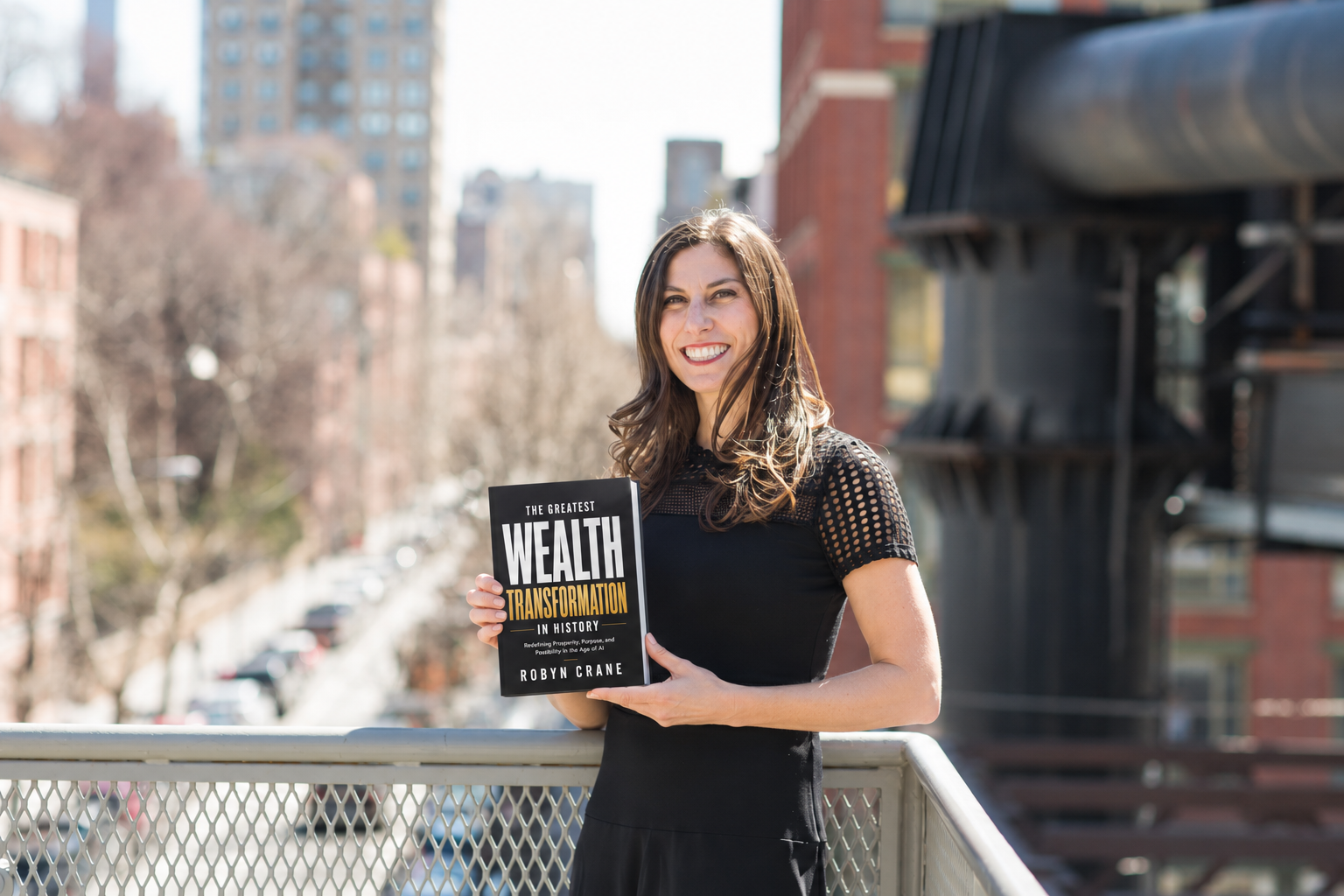 Robyn Crane holding Wealth Transformation